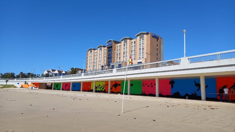 Bold murals brighten up Humewood Beach Bridge - Municipal project to boost Bay’s image as a tourism destination.