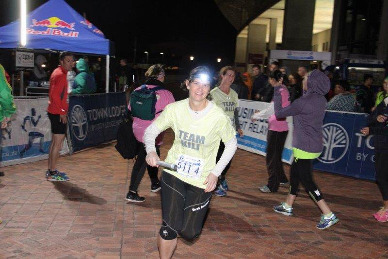 WIN UPSET IN STADIUM'S NIGHT RELAY